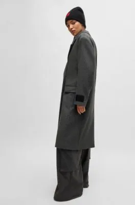Abrigo relaxed fit con cierre cruzado
