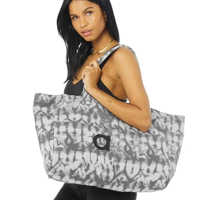 Adesigner Bag Men and Women Fiess Handheld Yoga Gran capacidad Bolsa de viaje a corto plazo Bolsas de lienzo