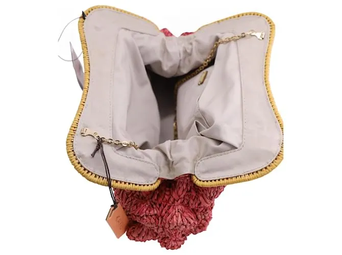 Autre Marque Cartera Kayu Monaco con ribete de ratán en rafia rosa 