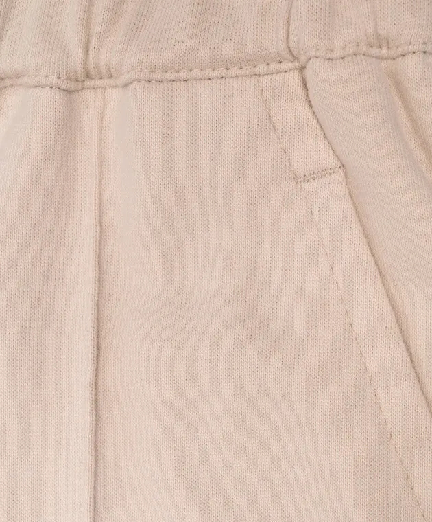 Brunello Cucinelli Children's beige track pants with a monil chain