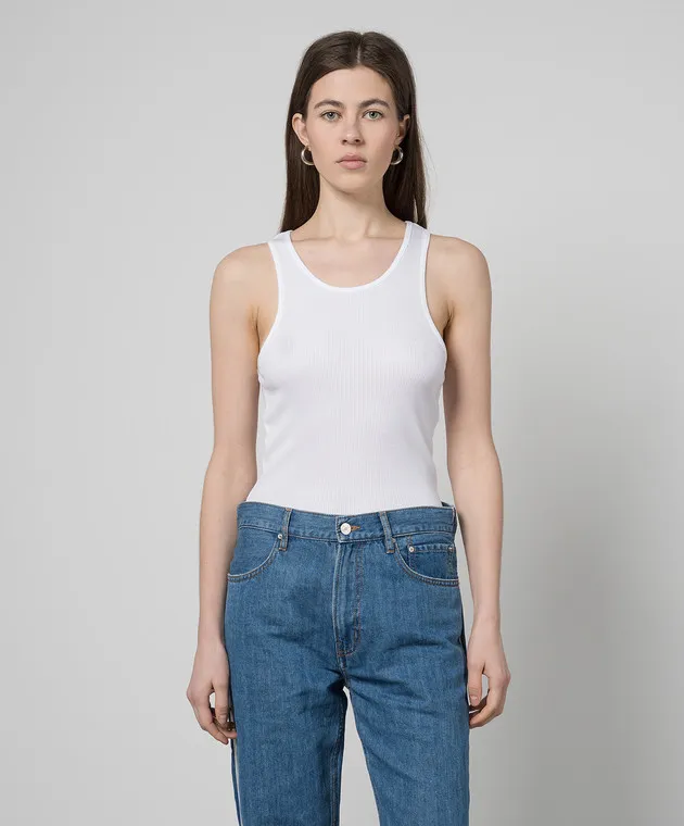 Gauchere White top with a scar