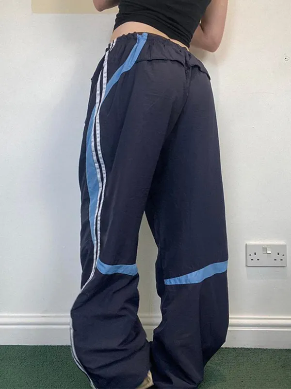 Pantalones anchos con rayas laterales