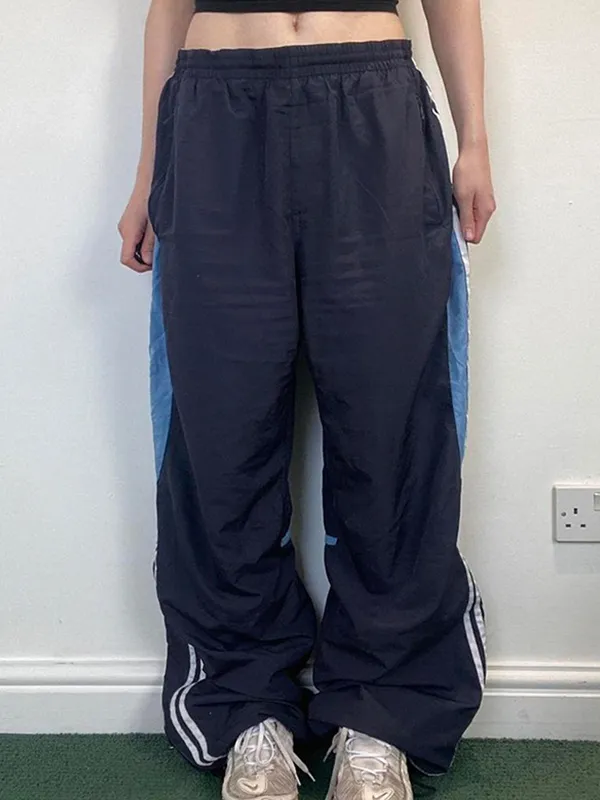 Pantalones anchos con rayas laterales