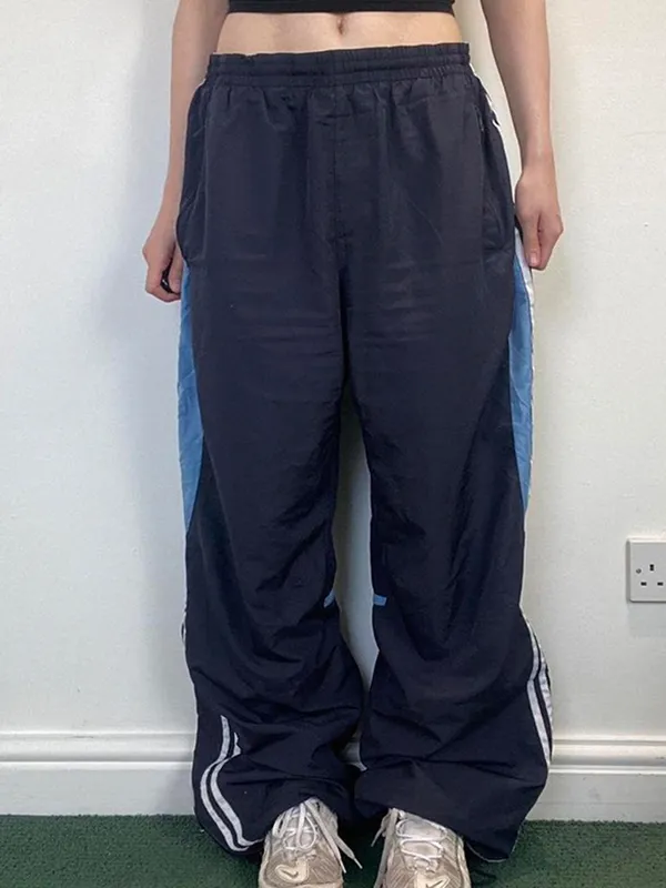 Pantalones anchos con rayas laterales