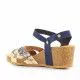 Sandalias cuña GENUINS azules con tiras cruzadas y animal print multicolor
